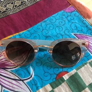 Powder sunglasses. Nearly new, fashionable and tinted lens.